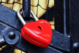 Safeguarding Seniors Against Financial Exploitation Locking Heart on Gate